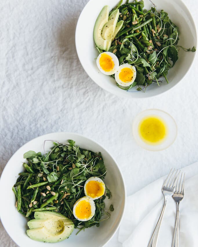 whole30 breakfast recipes: arugula, asparagus, and avocado breakfast salad