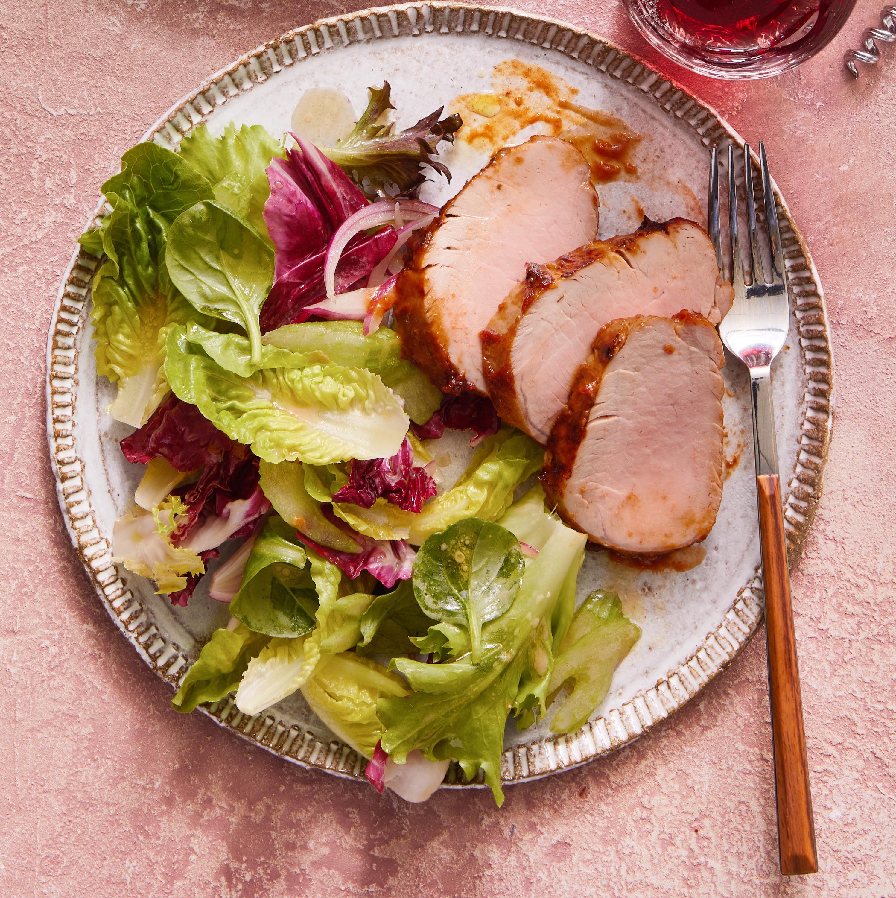 saucy chipotle pork tenderloin on plates