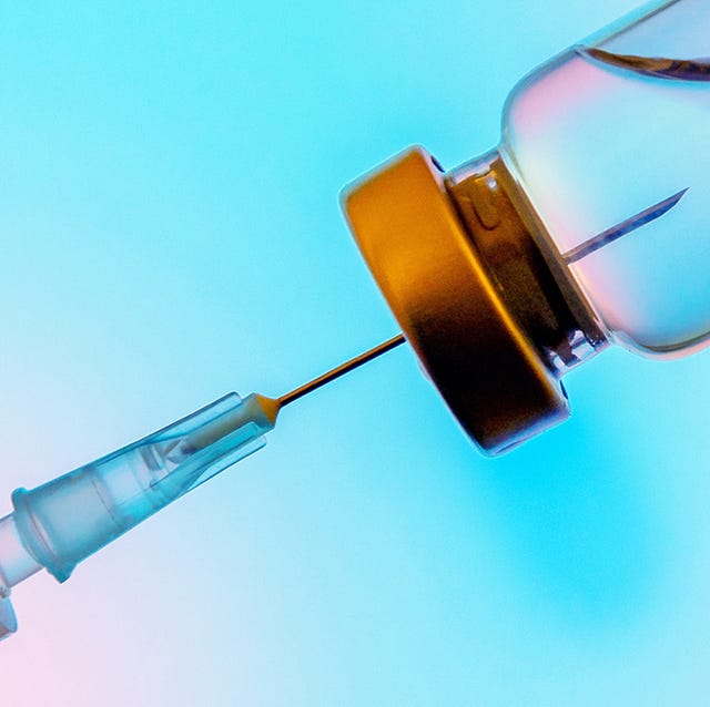 a close up of a needle in a vial