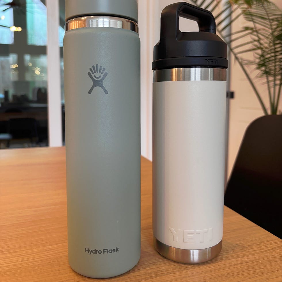 insulated drinkware items on a wooden surface