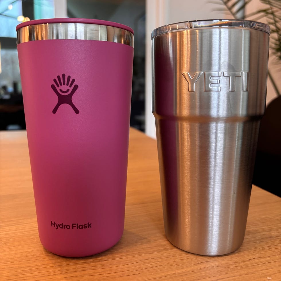 two drink tumblers on a wooden table