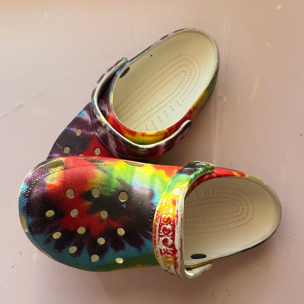 colorful tiedye clogs with ventilation holes and a strap