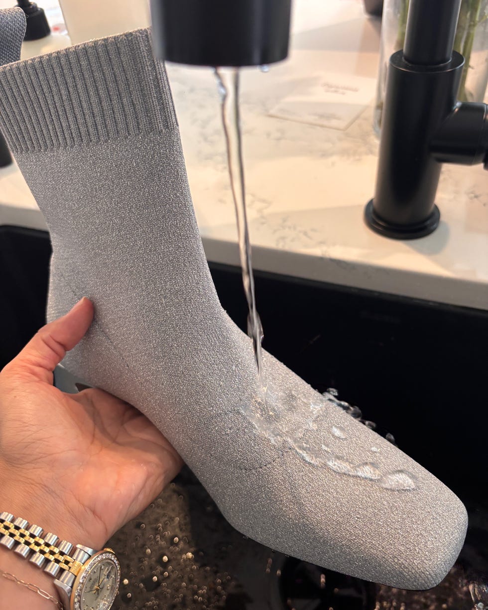 water being tested on a grey socklike shoe