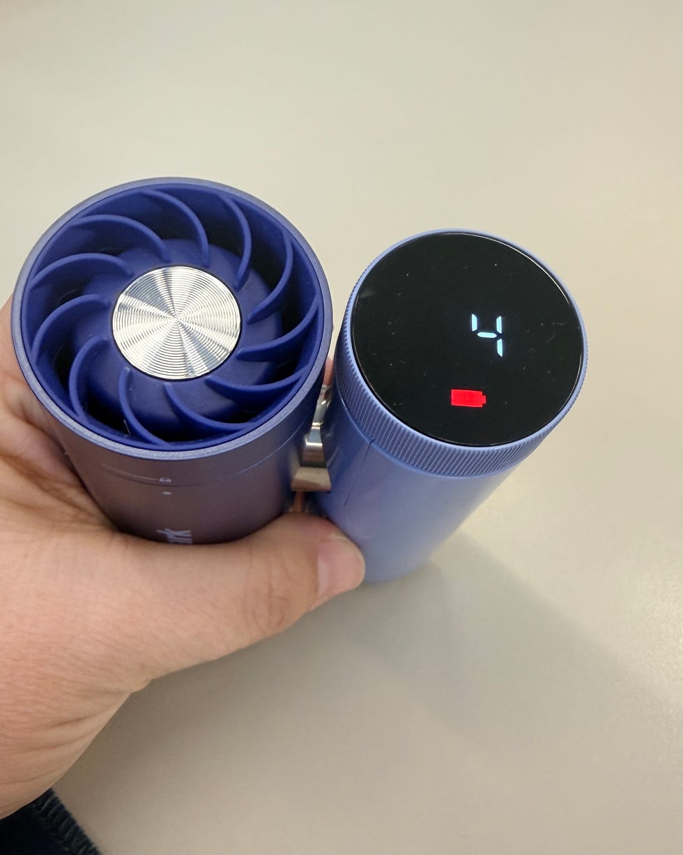 the shark chill pill being held in a hand with a display clearly read