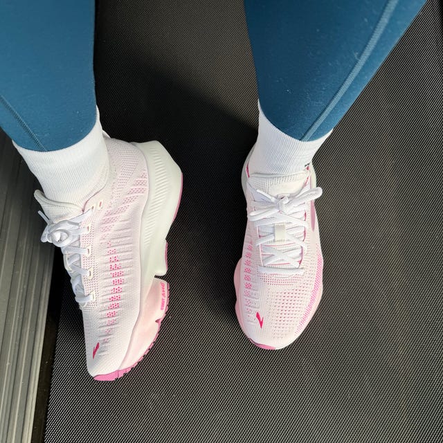 Running shoes on a treadmill surface