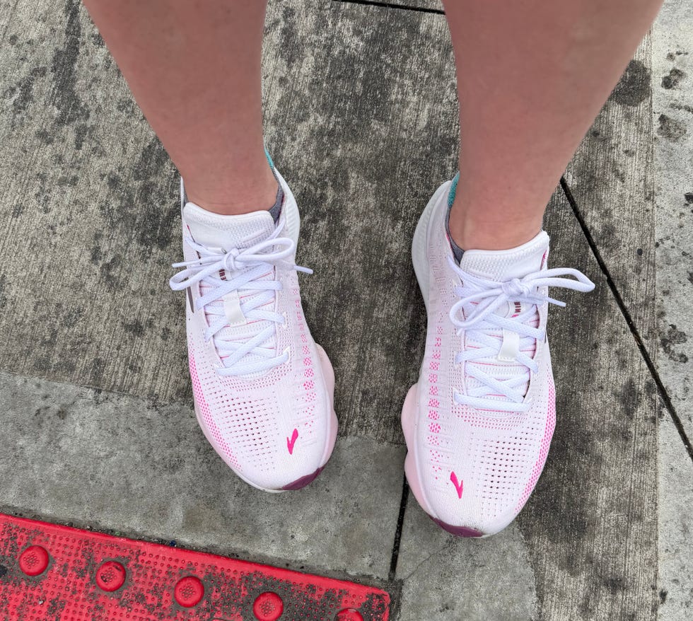 Athletic shoes on a concrete surface.