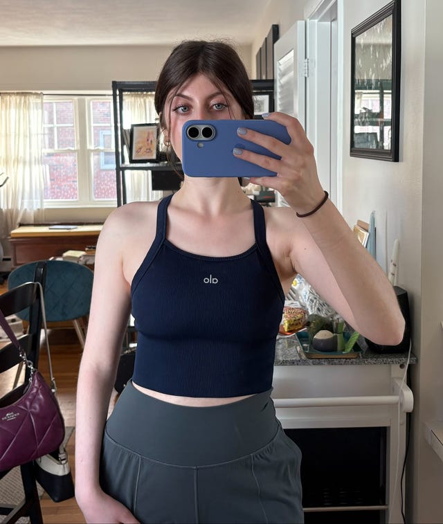 Self-portrait showing a person in workout attire.