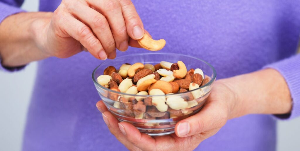 3 Subtle Side Effects of Eating Too Many Nuts, According to Experts