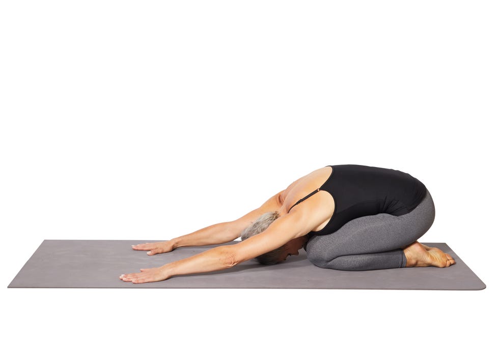 woman doing child's pose