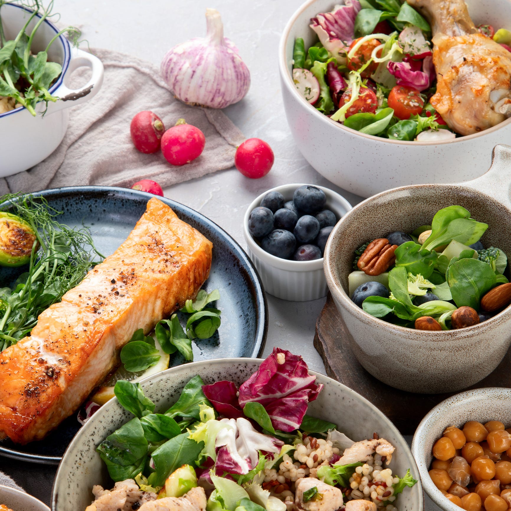 healthy food assortment on light background dieting concept