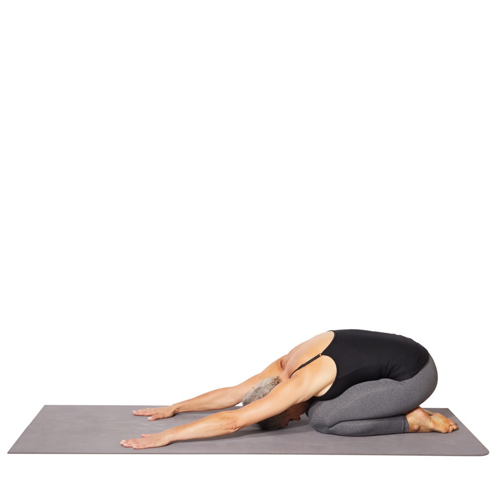 woman doing child's pose