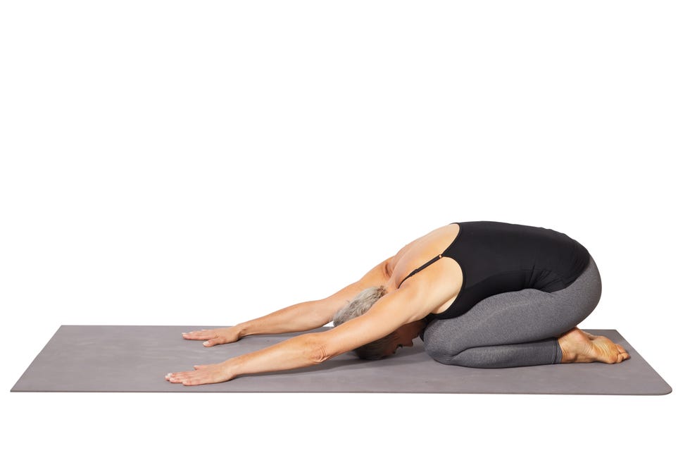 woman doing child's pose