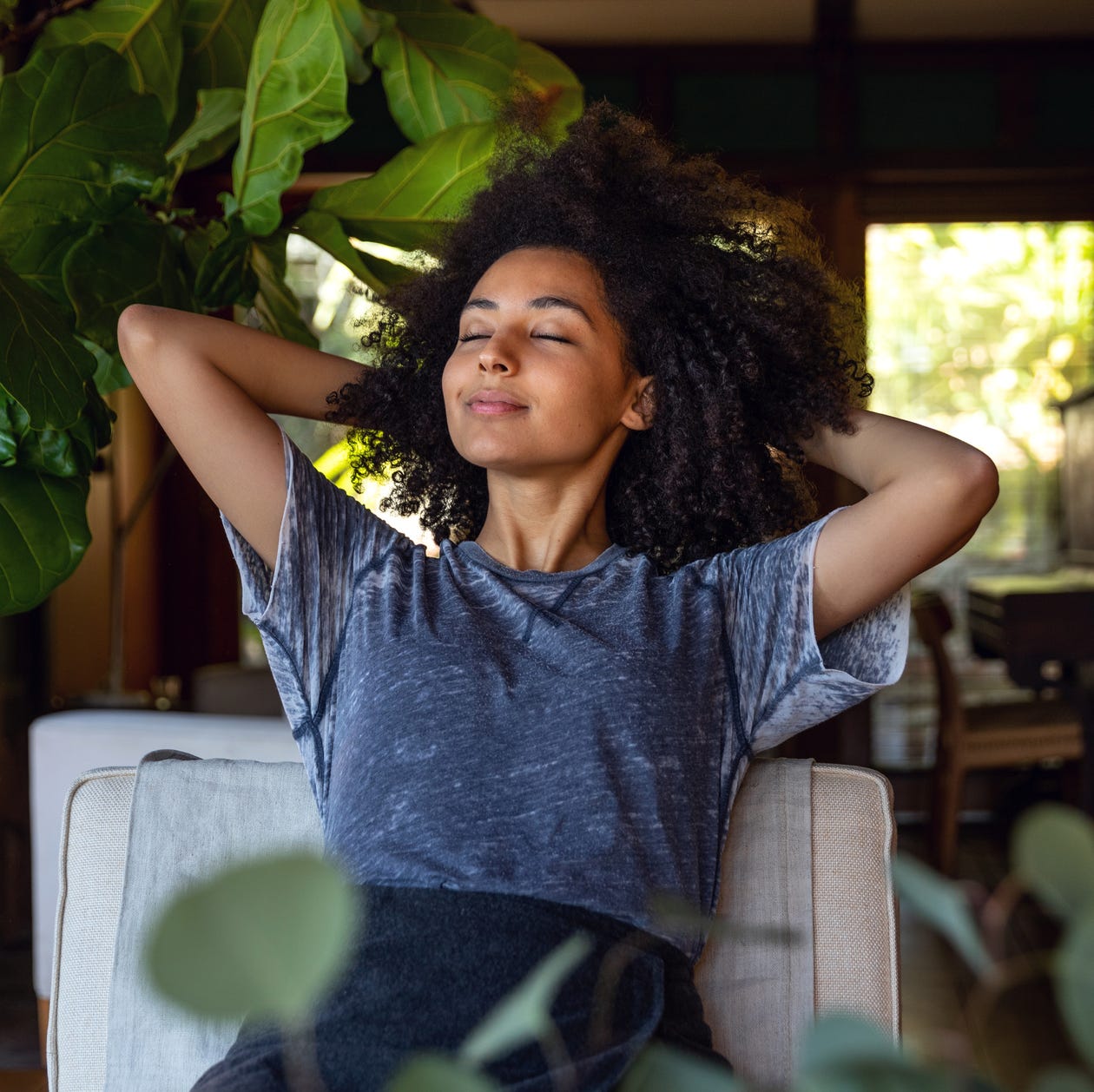 Young woman spending a relaxing day in her beautiful home